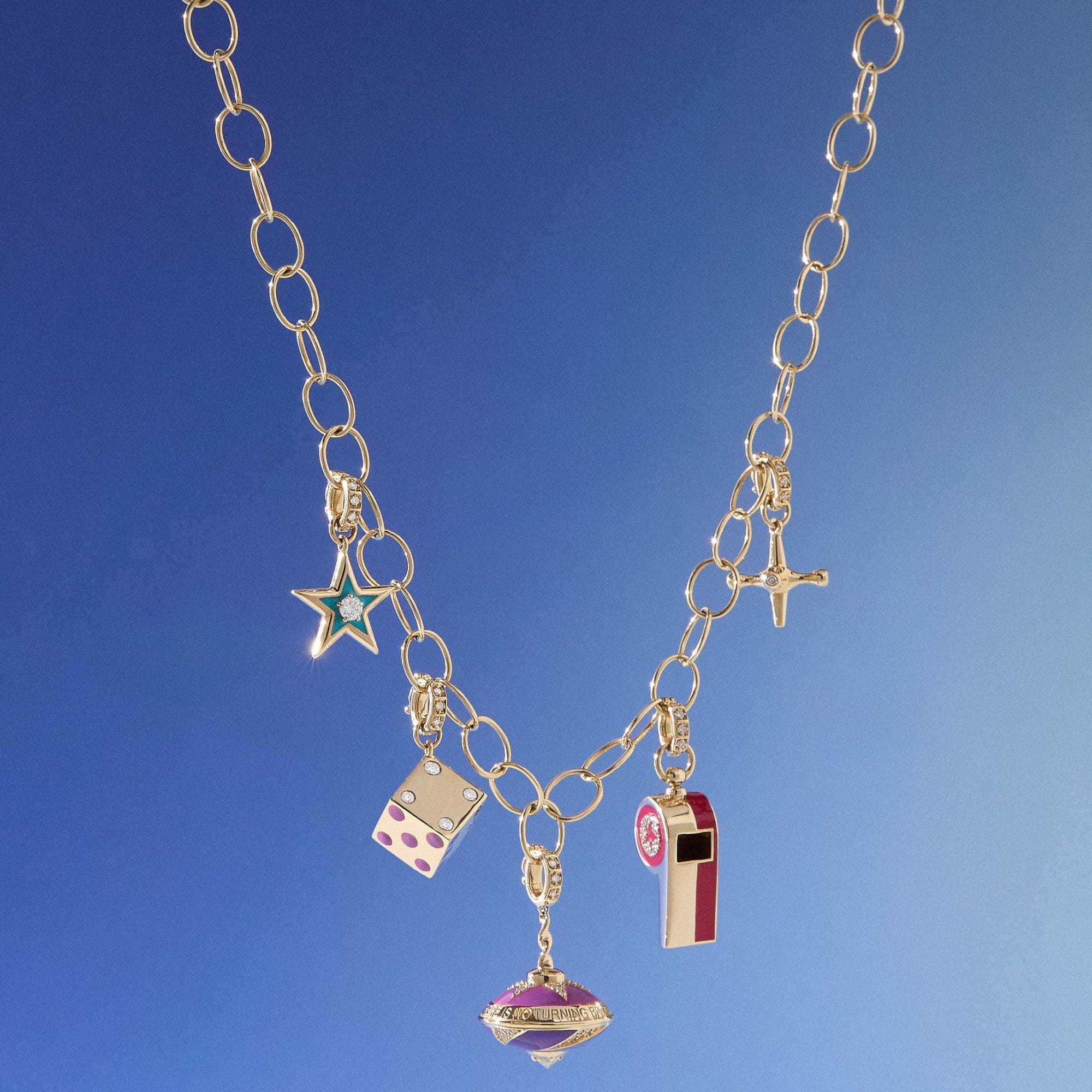 gold chain link necklace with toy inspired solid gold charms