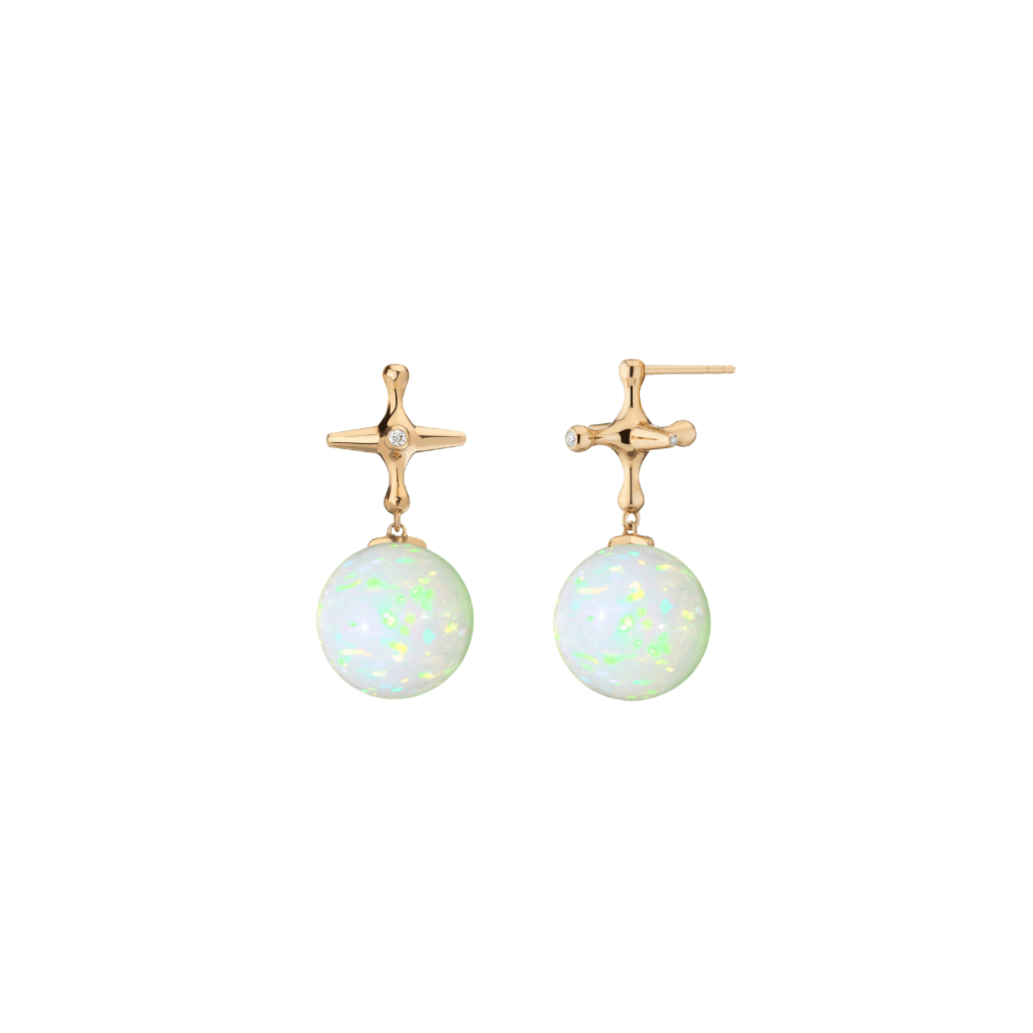 Mined and Found bounce back earrings with Jax toy top and Ethiopian opal sphere beneath