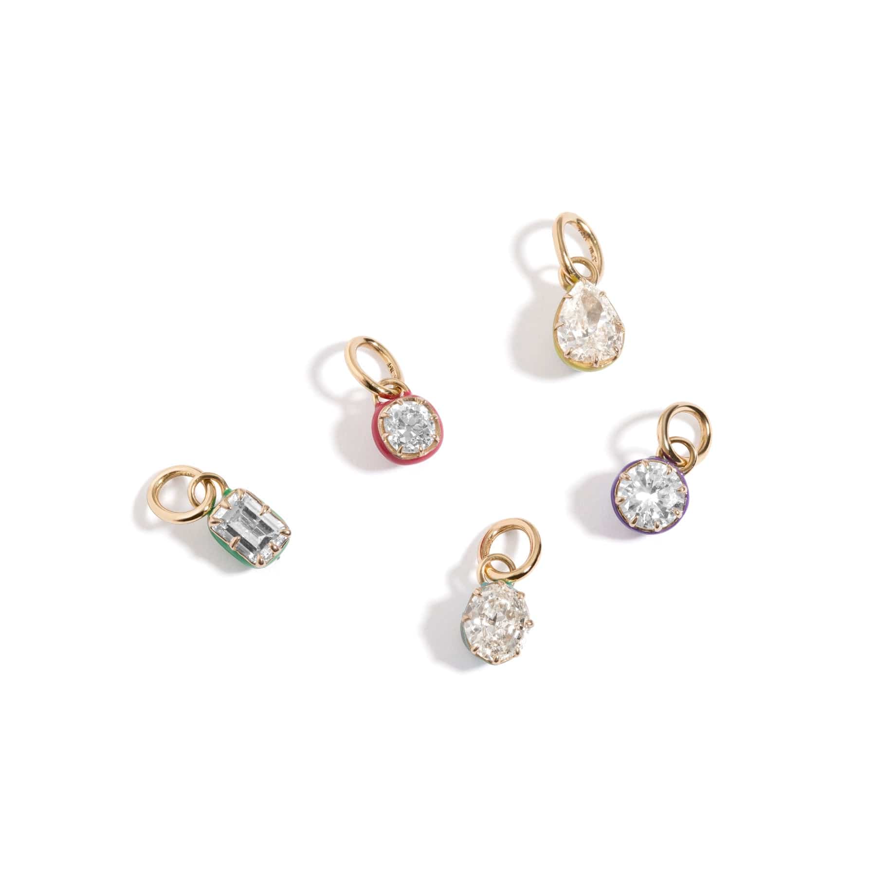 Mined and Found group of nova diamond solitaire pendants in antique inspired settings