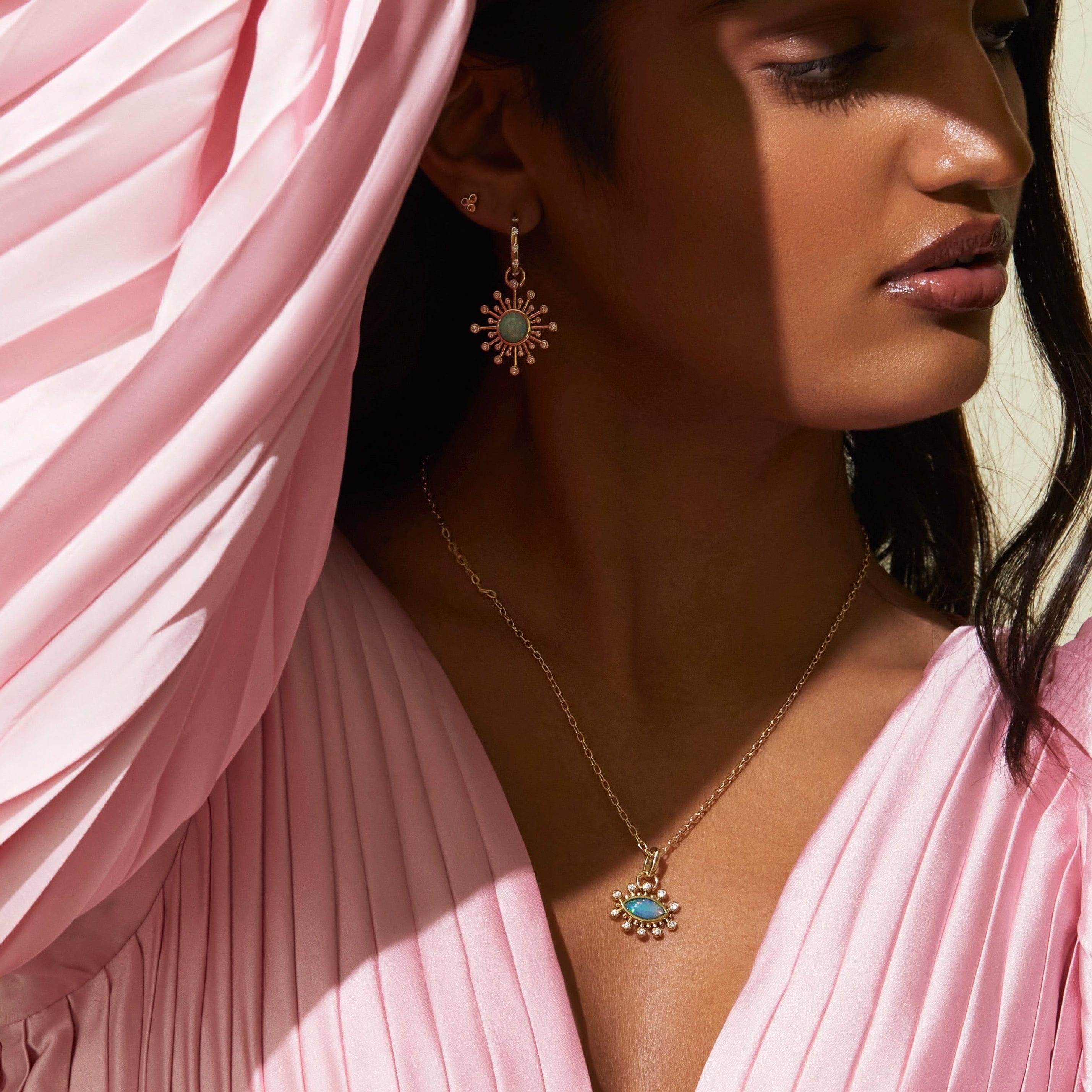 model wearing Mined + Found delicate long links chain and opal pendants