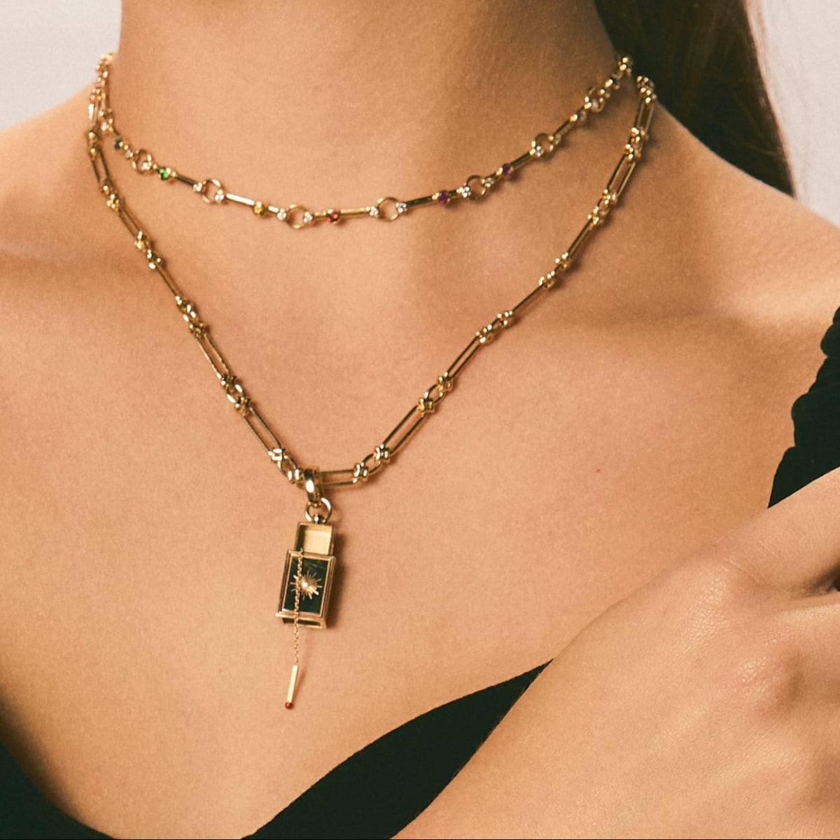 mined and found's hope matchbox pendant on a yellow gold open link chain